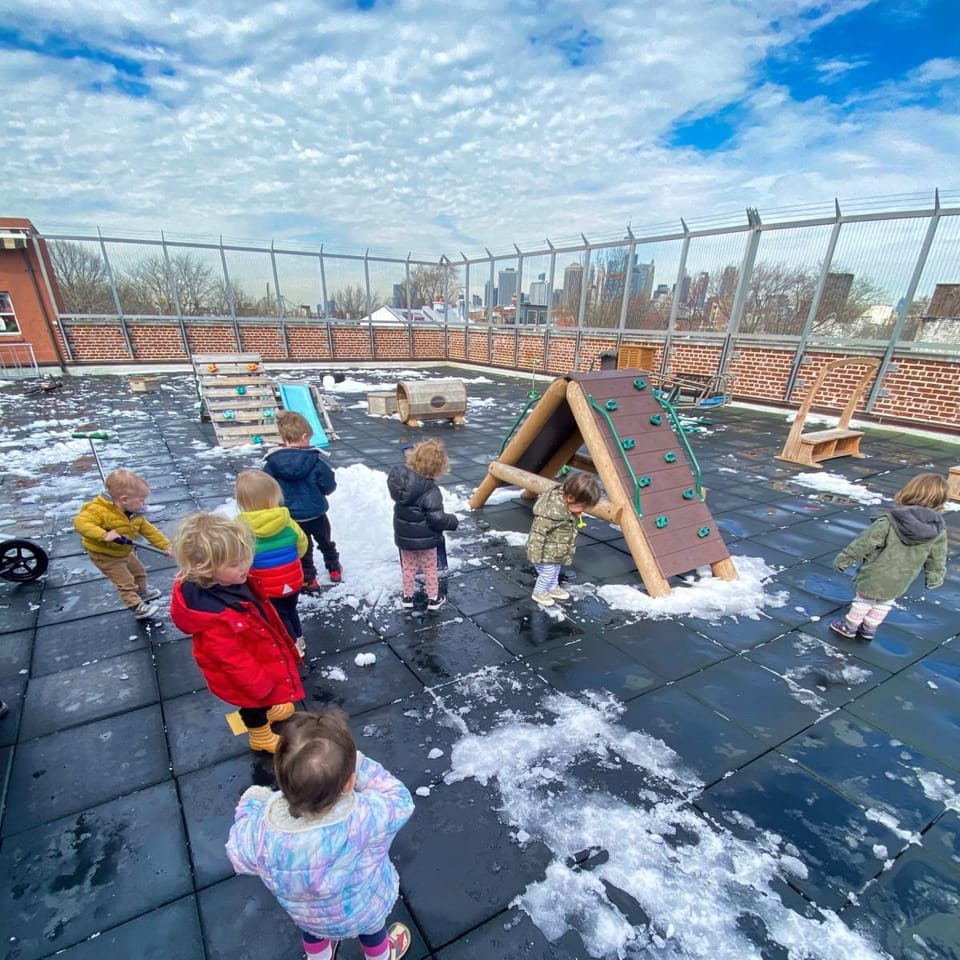 Children playing on the rooftop in winter
